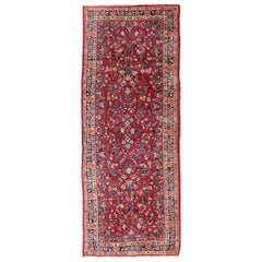 Antique Sarouk Long Gallery Runner with All-Over Flower Design in Red Background