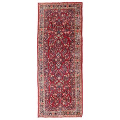 Antique Sarouk Long Gallery Runner with All-Over Flower Design in Red Background