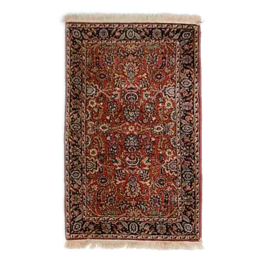 An antique Sarouk oriental rug offers wool construction with foliate and floral design, circa 1930

Measures - 64.5