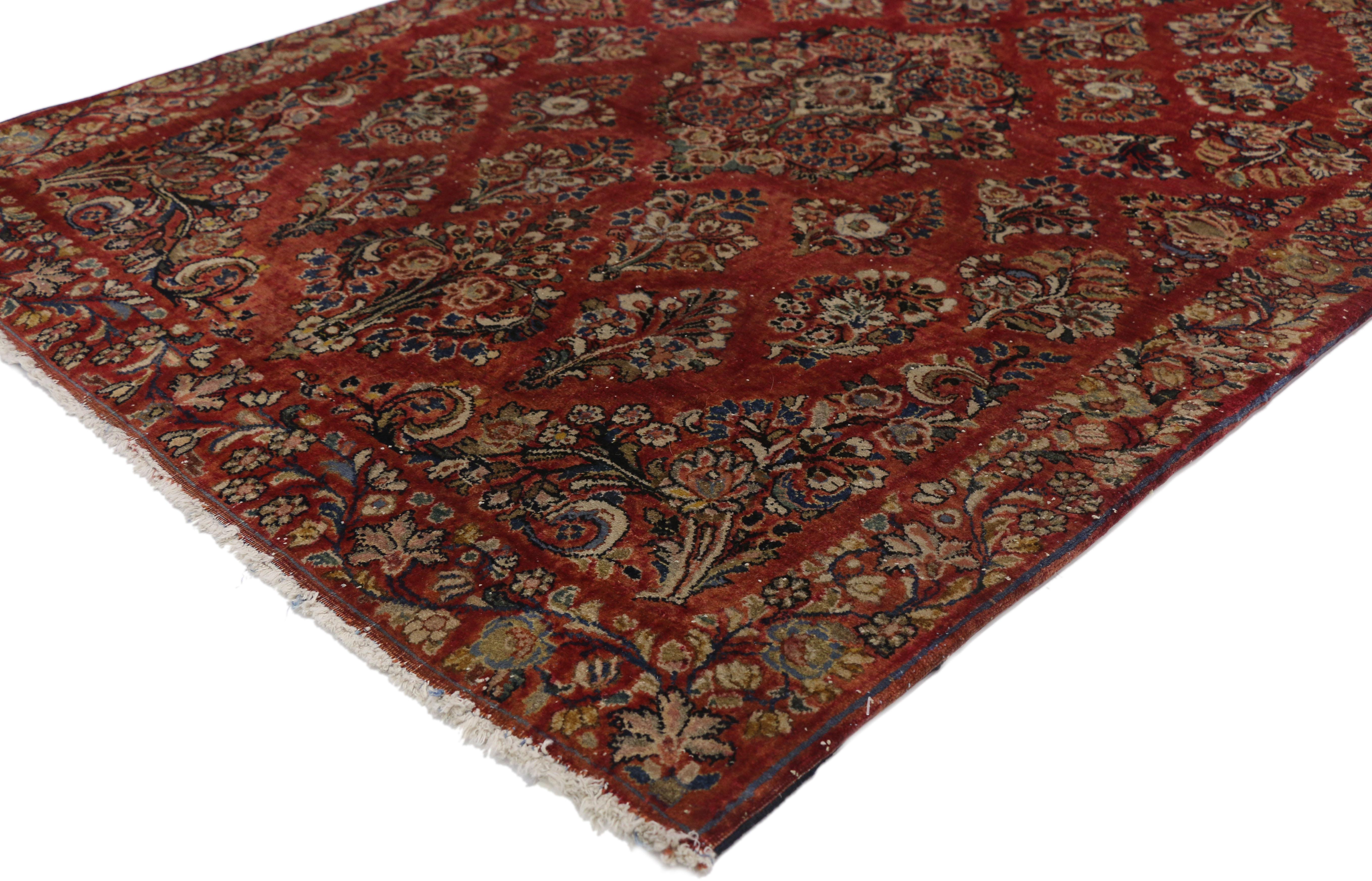 76921 Antique Sarouk Persian Rug with Old World Victorian Style. Immersed in Persian history, this highly desirable antique Sarouk Persian rug with traditional old world Victorian style features an impressive all-over floral spray pattern rendered
