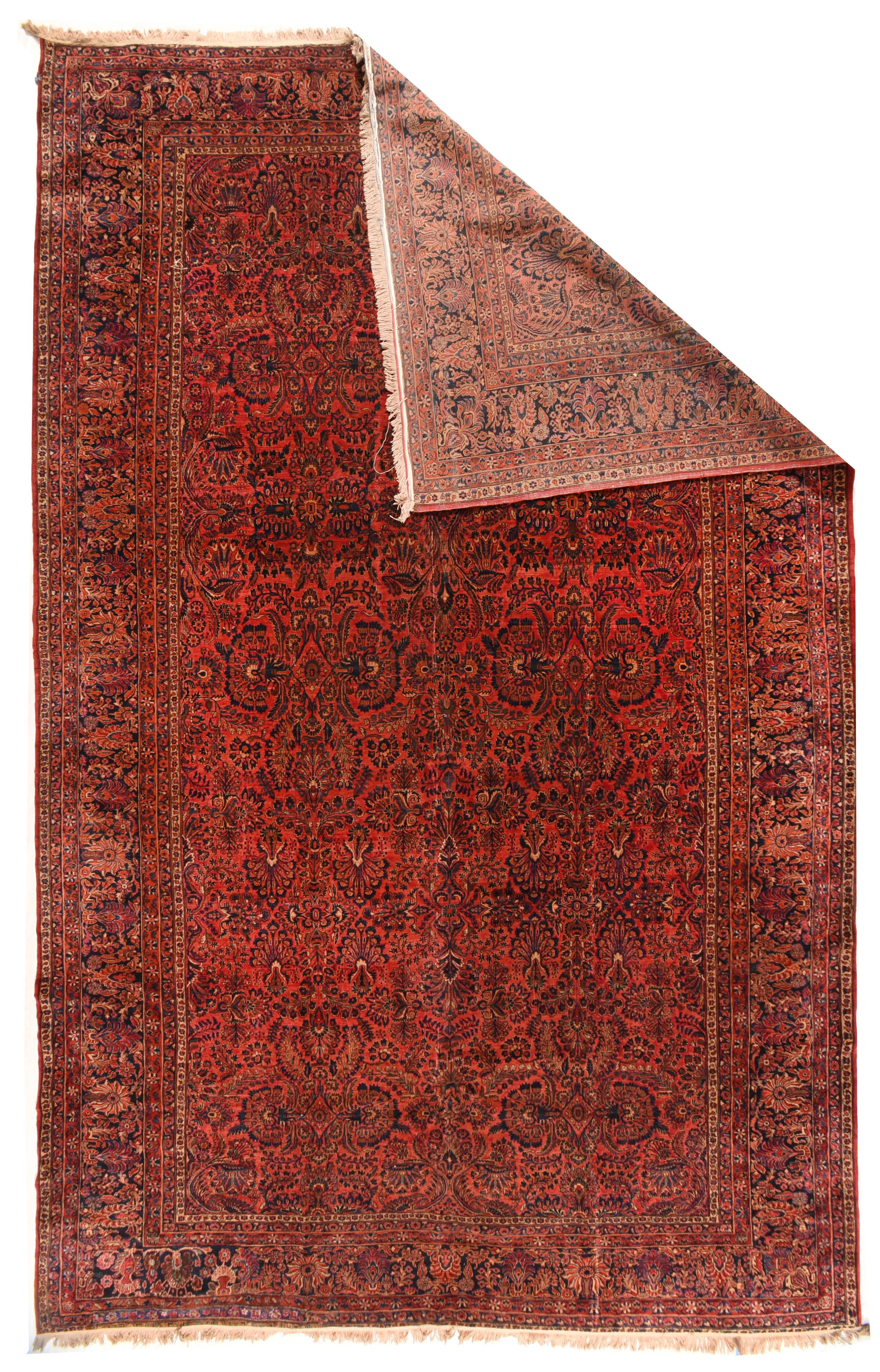Sarouk rug measures 12'0'' x 18'6''.