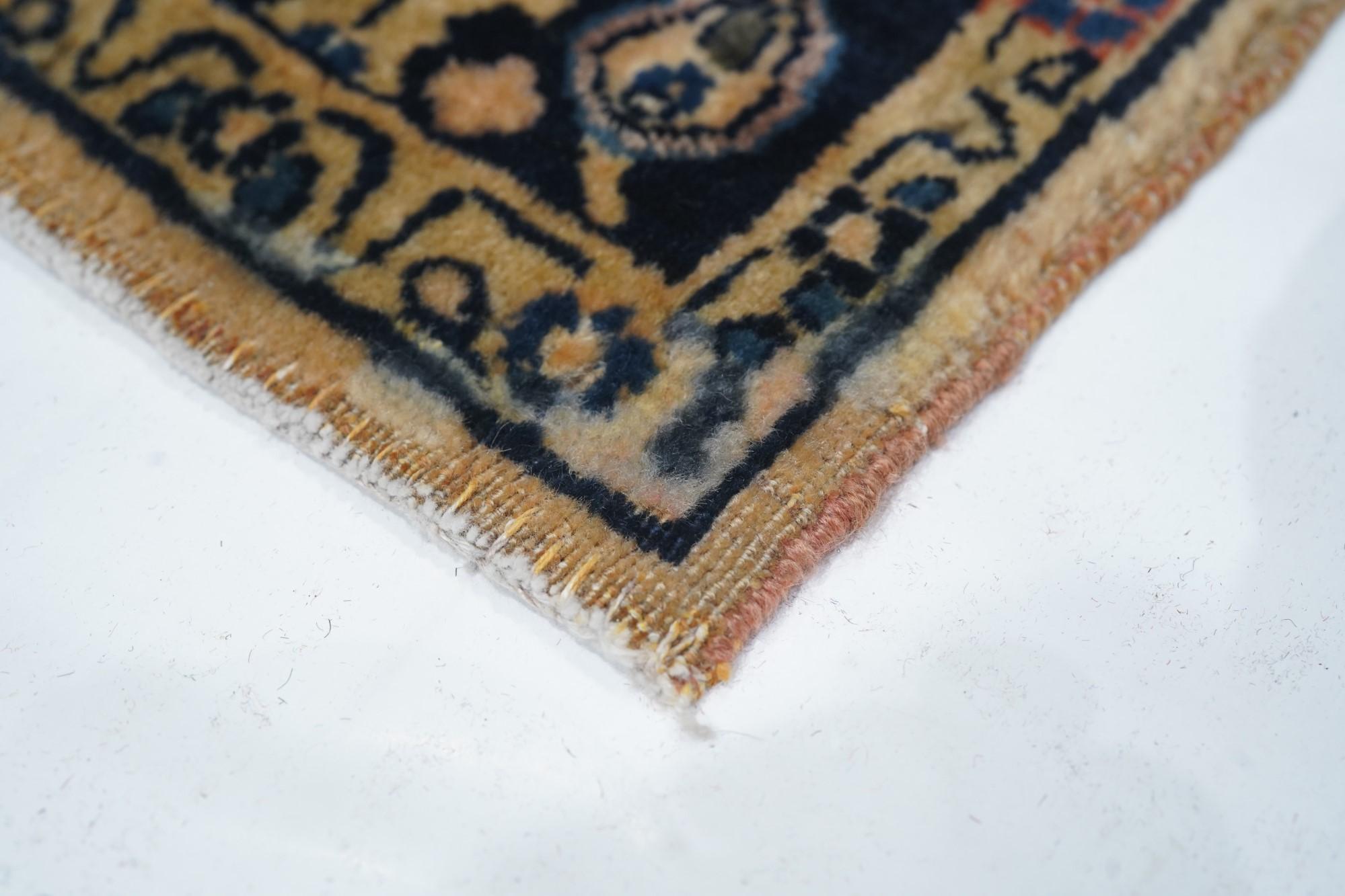 Antique Sarouk rug, measures :3'5'' x 5'. This relatively well-woven West Persian scatter shows a subtly variegated sandy straw field with a stepped, open cartouche medallion with a blue rosette centre and flanking floral trails. Field coverage of