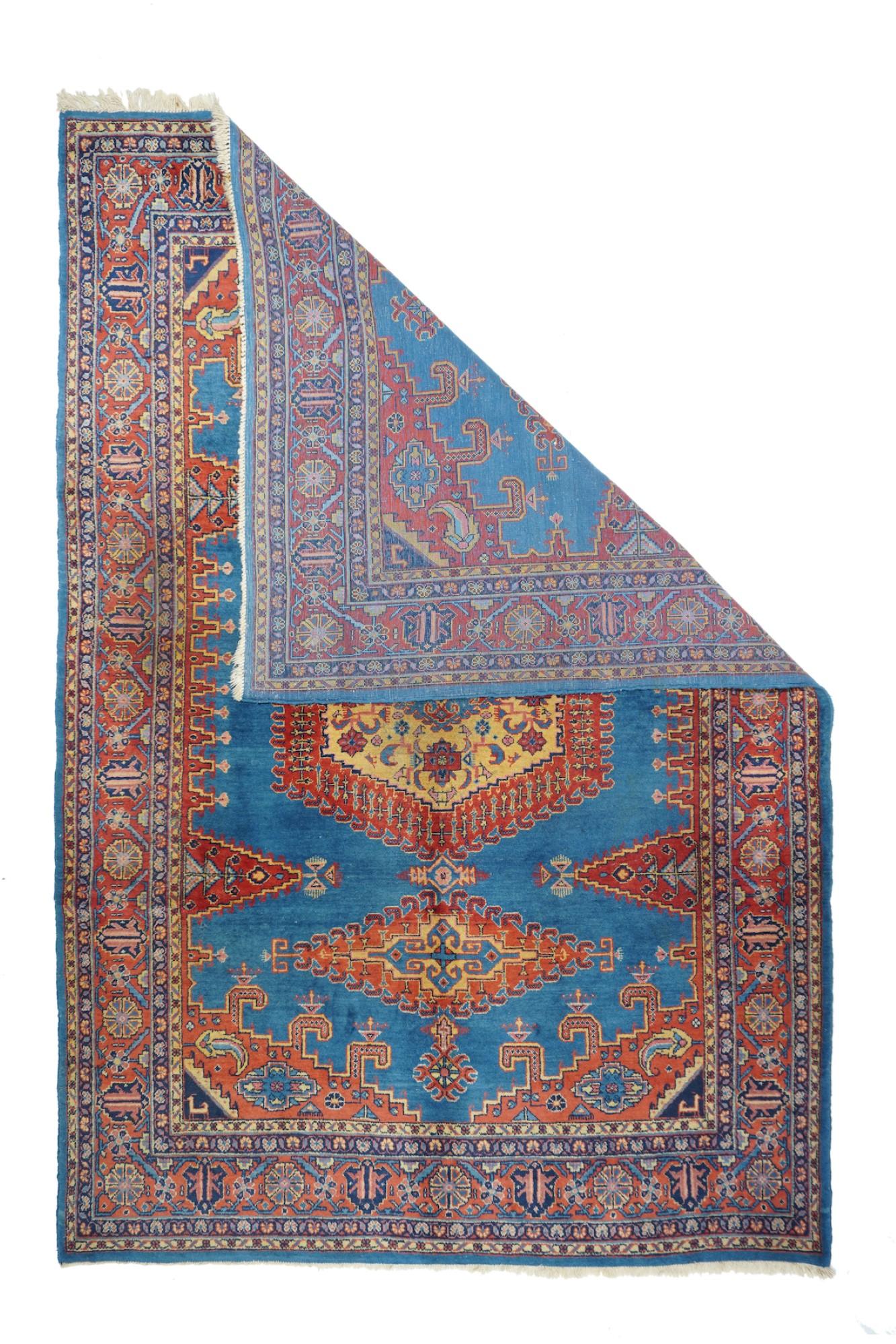 Antique Sarouk rug measures 7'1'' x 10'6''.