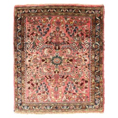 Antique Sarouk Rug in Small Size with Red Field, Colorful Florals, Medallion