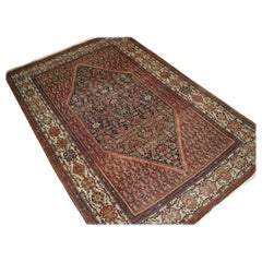 Antiker Sarouk-Teppich mit zentralem Medaillon