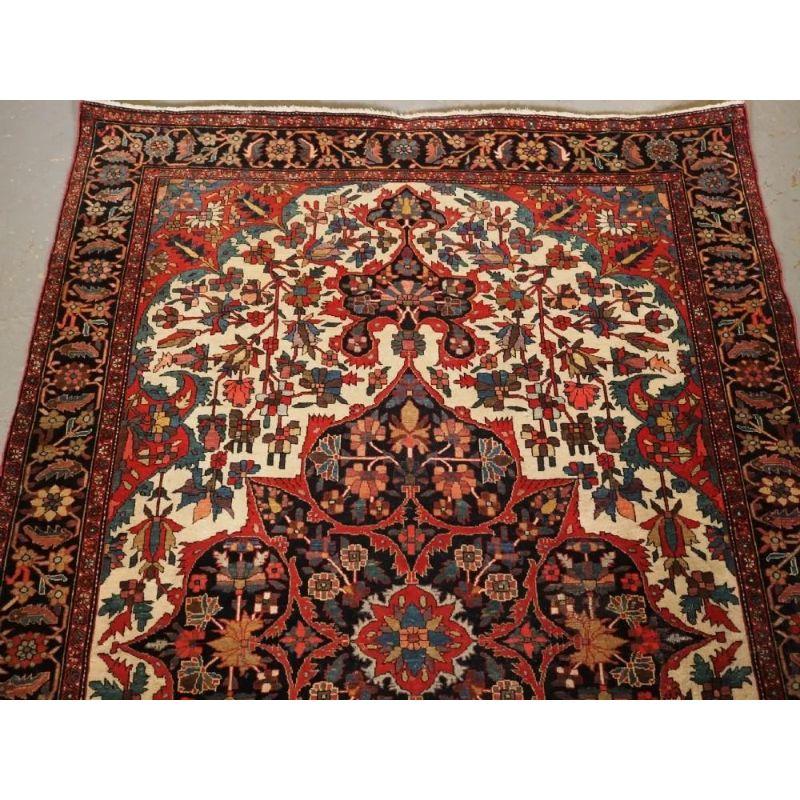 Asian Antique Sarouk Rug with Classic Floral Medallion, circa 1900/20 For Sale
