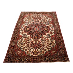 Antiker Sarouk-Teppich mit klassischem geblümtem Medaillon, um 1900/20