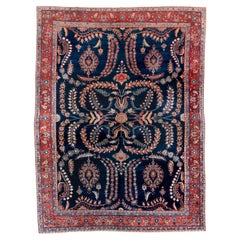 Antique Sarouk Style Rug with Floral Medallion Design