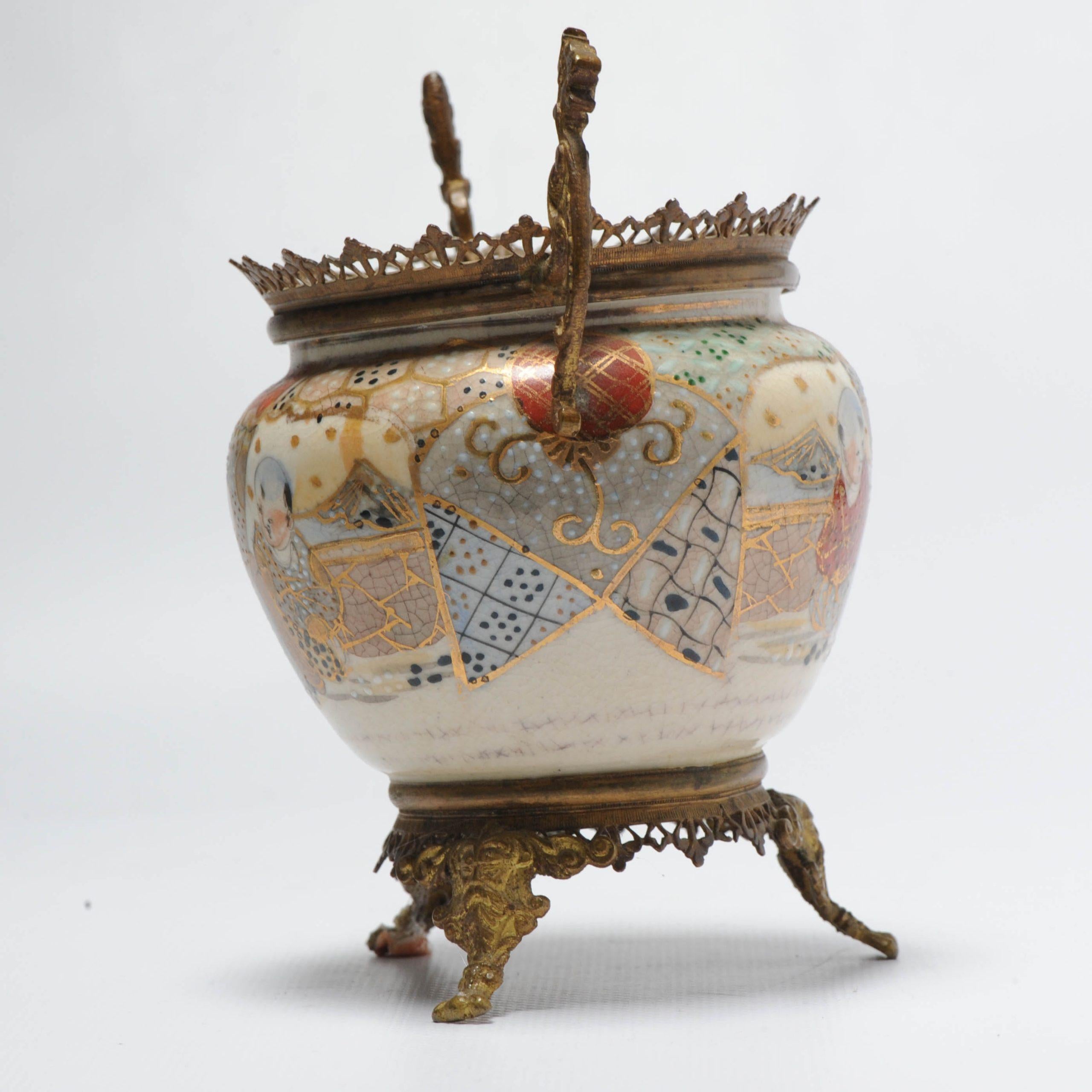 A nice Example Satsuma Mounted or Oromulu-mounted.

1. What exactly are ‘mounted porcelains’?
The term ‘mounted porcelains’ refers to pieces of porcelain — originally produced in China, Japan or Europe — which are further embellished with