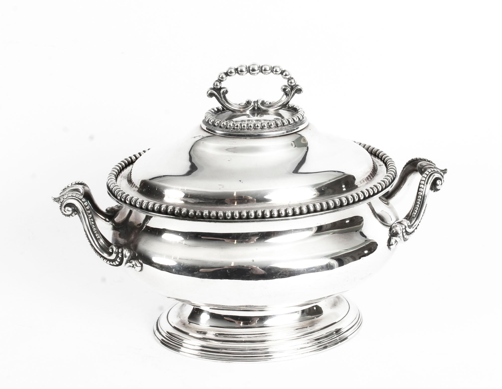 This is an exquisite and rare antique English silver plated sauce tureen, circa 1860 in date.
 
This lovely sauce tureen is oval in shape and features splendid beaded decoration to the border, the two graceful handles which are positioned one to