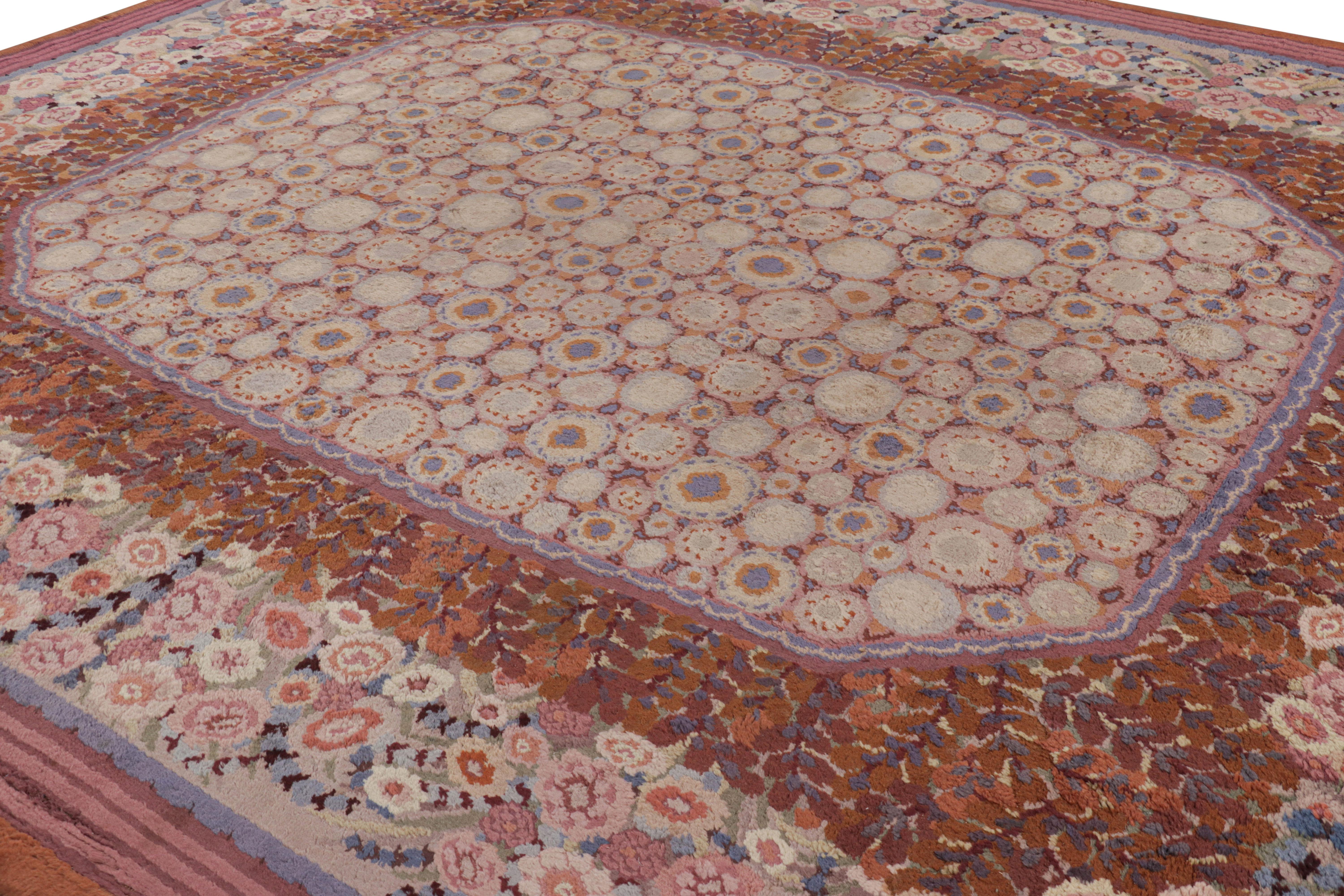 Made with hand-knotted wool and velvet, this 12x13 antique Savonnerie rug represents an extraordinary addition to Rug & Kilim's European collection—an exquisite example of French decorative arts that brilliantly bridges classical and Art Deco