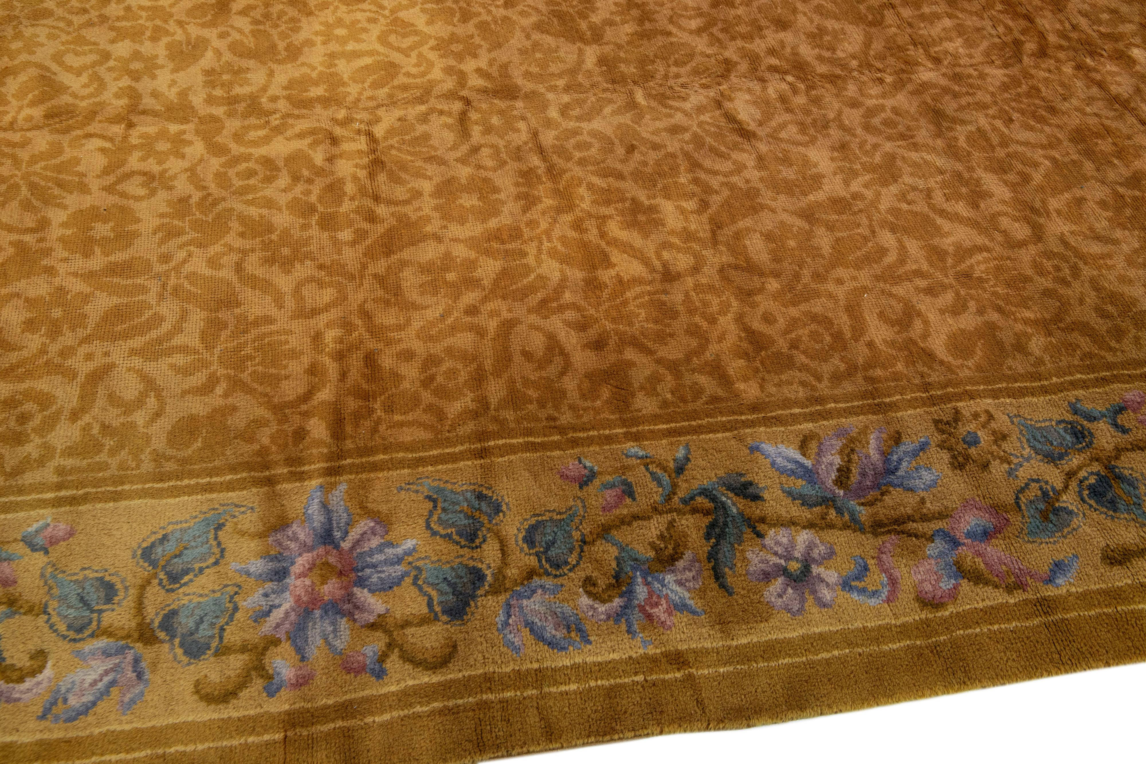 20th Century Antique Savonnerie Handmade Golderod Wool Rug with Allover Floral Motif For Sale