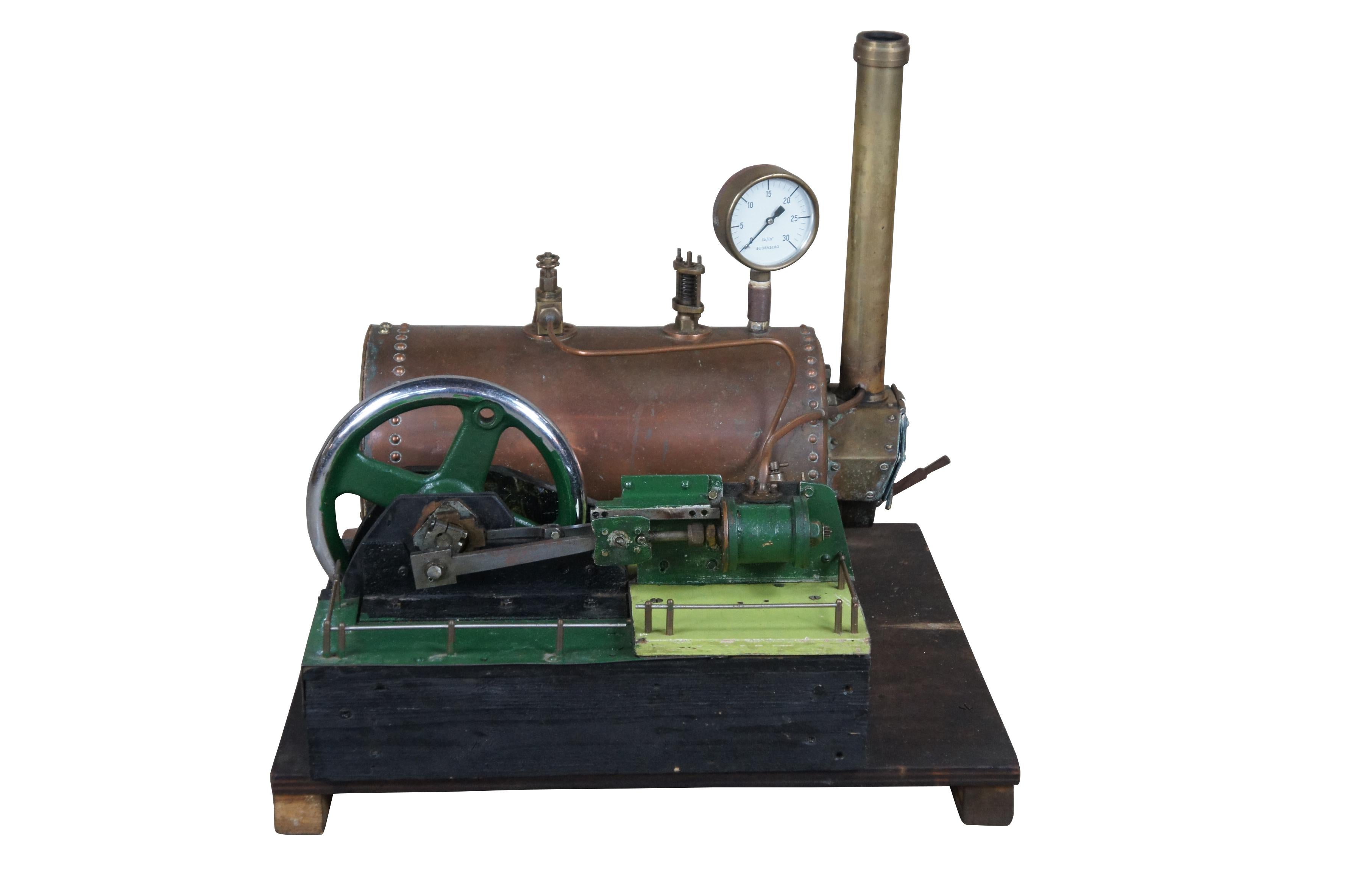 Antique 19th century Schaeffer & Budenberg stationary steam engine model.  Made of cast iron featuring copper boiler

The Budenberg Gauge Company was founded in 1918. The original parent company was Schäffer & Budenberg founded in 1850 by Bernhard