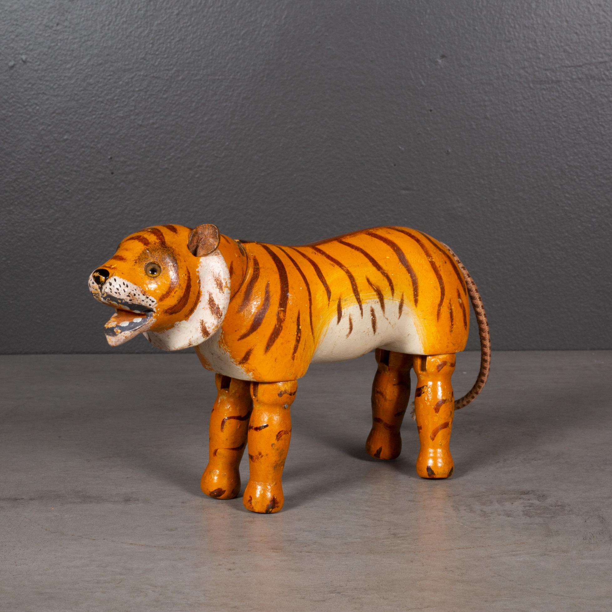 ABOUT

Jointed wooden Tiger manufactured in the 1900s by the Schoenhut Piano Company as part of the 