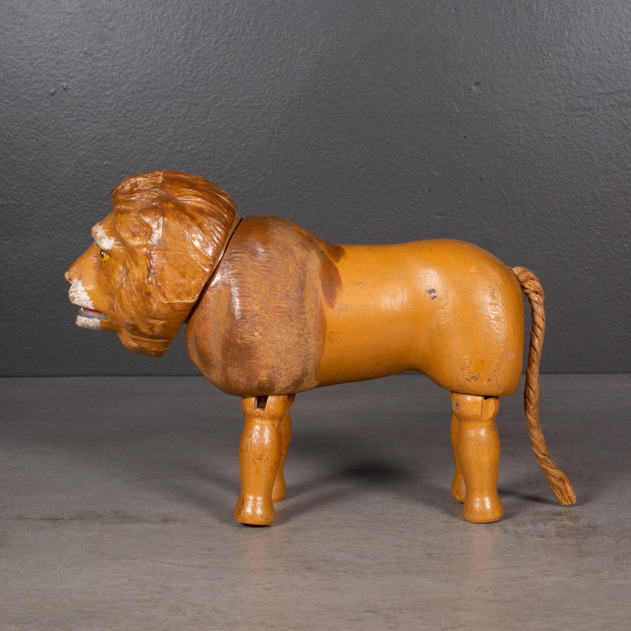 ABOUT

Jointed wooden lion manufactured in the 1900s by the Schoenhut Piano Company as part of the 