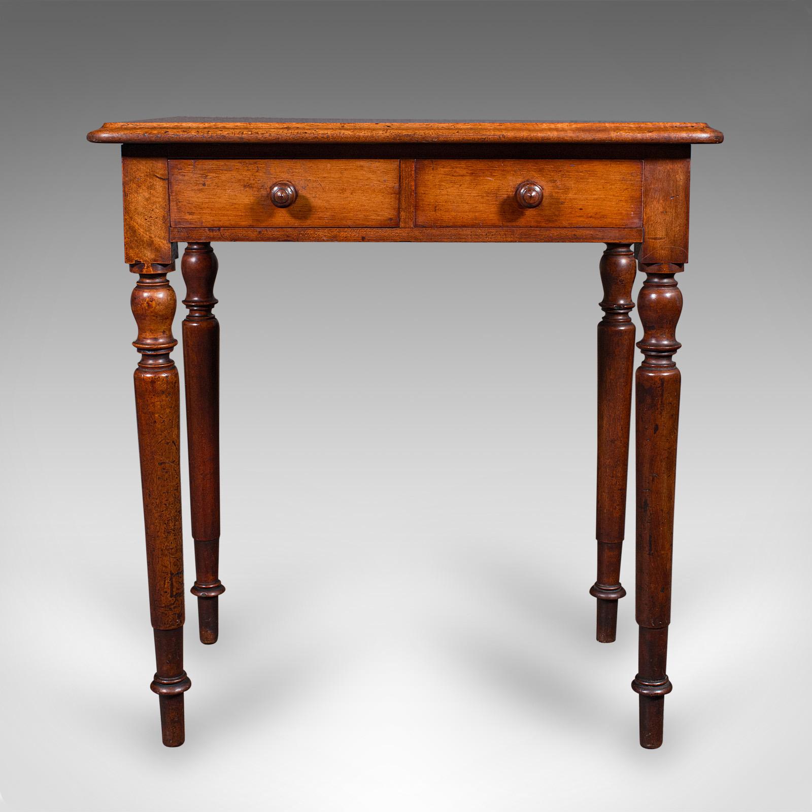 
This is an antique scholar's writing table. An English, mahogany side table or desk, dating to the Victorian period, circa 1870.

Charming, small writing table with an appealing appearance
Displays a desirable aged patina and in good original