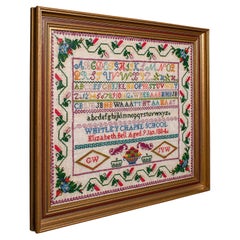 Échantillon d'école antique anglais, présentant des broderies à l'aiguille, victorien, 1884