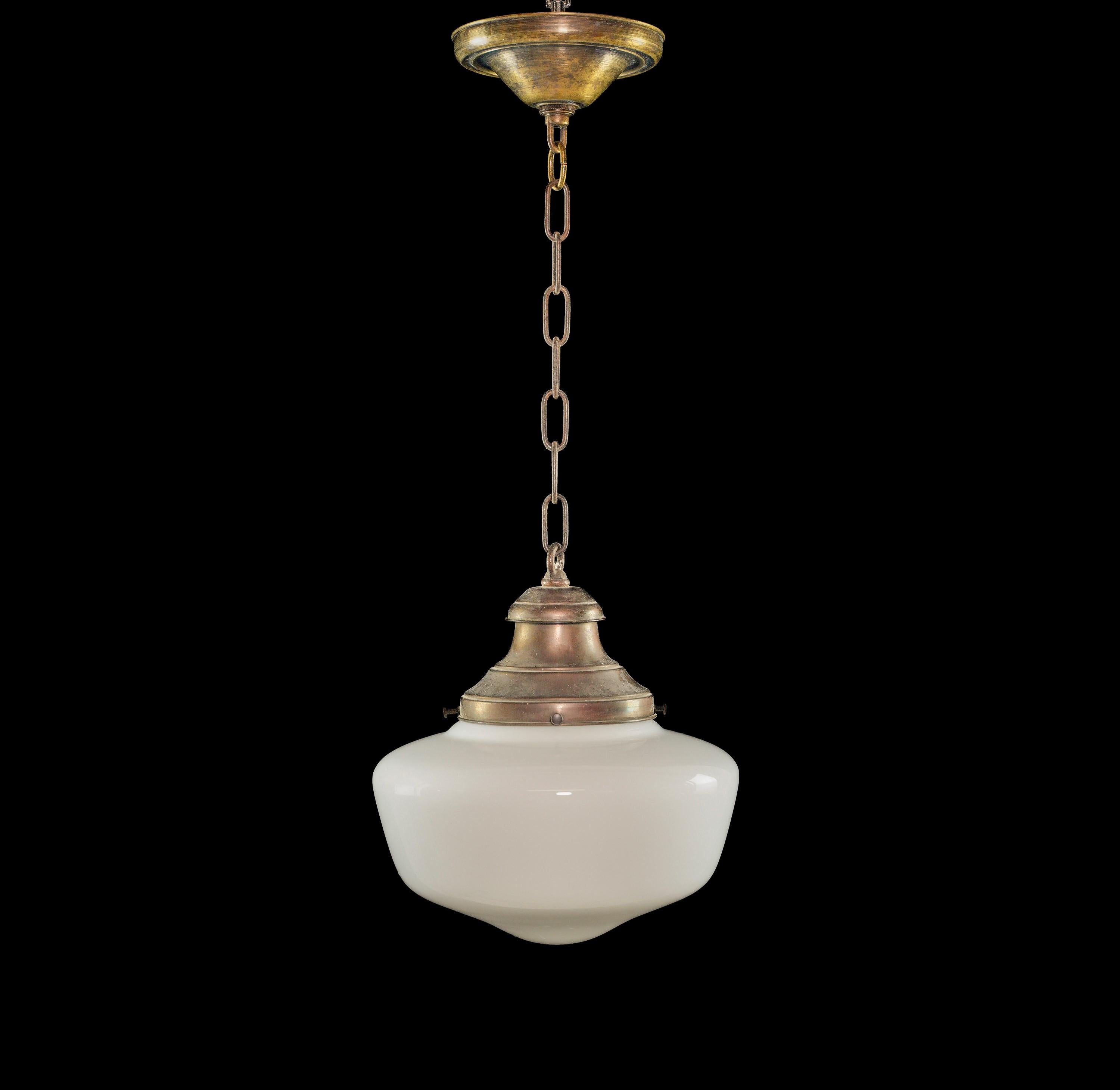 White schoolhouse glass pendant light with a brass chain fitter. Cleaned and restored. Please note, this item is located in our Scranton, PA location.