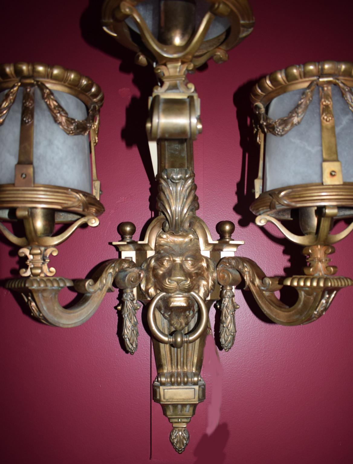 Very fine pair of three-light gilt bronze sconces in the Louis XIV style with alabaster shades.