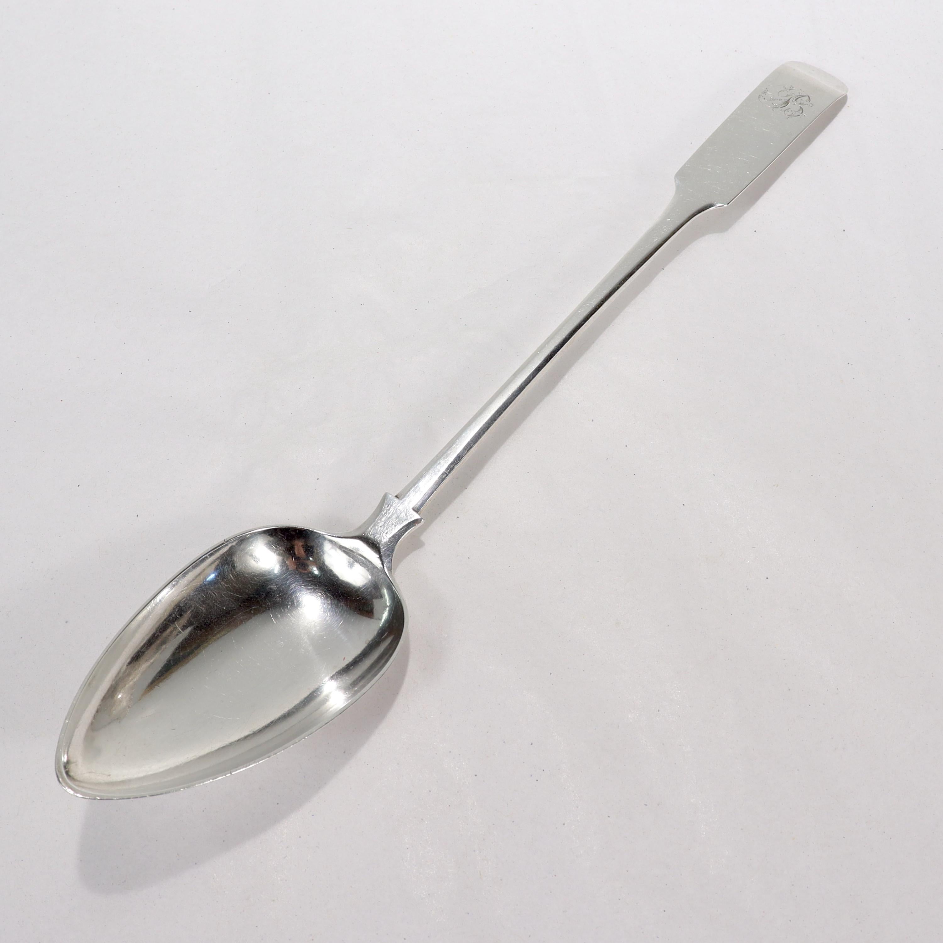 A fine antique fiddle pattern stuffing spoon.

In sterling silver.

By John Heron of Edinburgh, Scotland. 

Monogrammed to the handle with a 'B'. 

Simply a wonderful, rare Scottish period stuffing spoon!

Date:
1809

Overall Condition:
It is in
