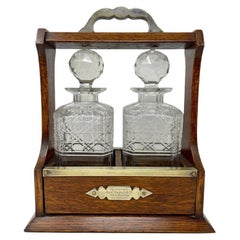 Antique Scottish Golden Oak and Cut Crystal Two-Bottle Tantalus, Circa 1890-1900