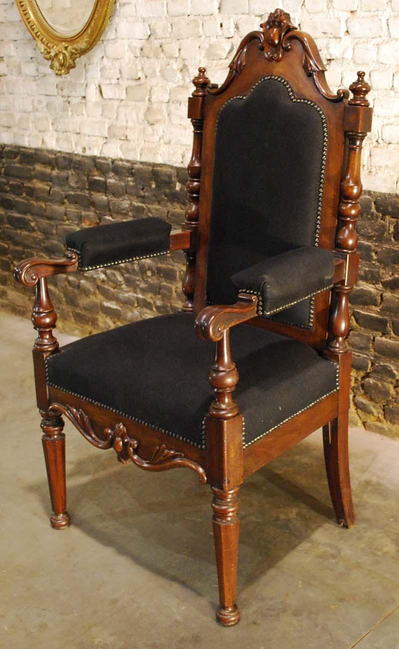 antique upholstered armchair