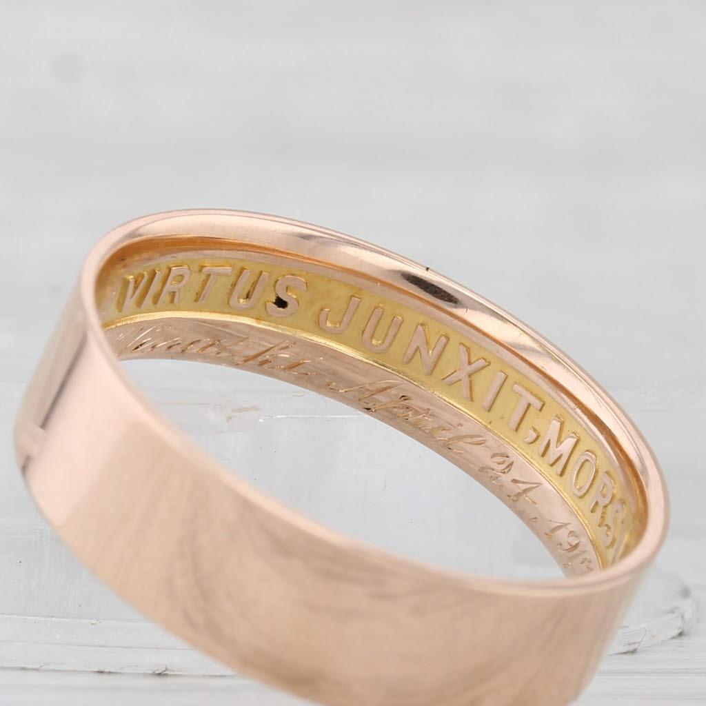 Metal: 14k Rose Gold
Weight: 6 Grams 
Stamps: 14k Virtus Junxit Mors Non Separabit 
Engraved: F Winaski April 24 1917
Rise Above Finger: 1.1 mm
Band / Shank Width: 6.6 mm

This ring is a size 12, but it can be resized down 3 sizes for a $20 fee or