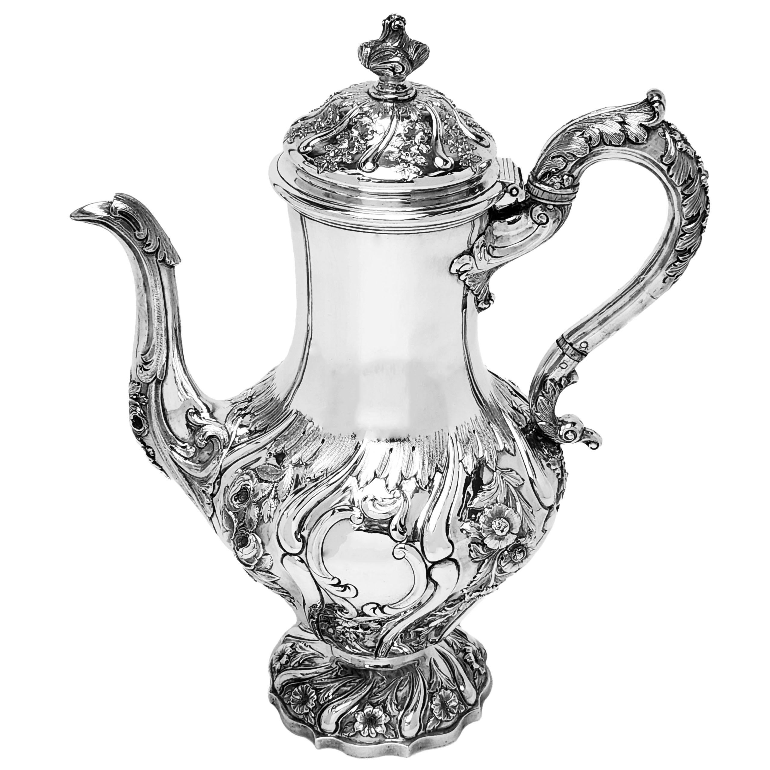 A lovely Antique Victorian Scottish Silver four piece Tea & Coffee Set with in a classic baluster shape. Each piece of this Tea Set is embellished with a  gorgeous floral and scroll chased patterns and acanthus leaf patterning on the scroll handles.