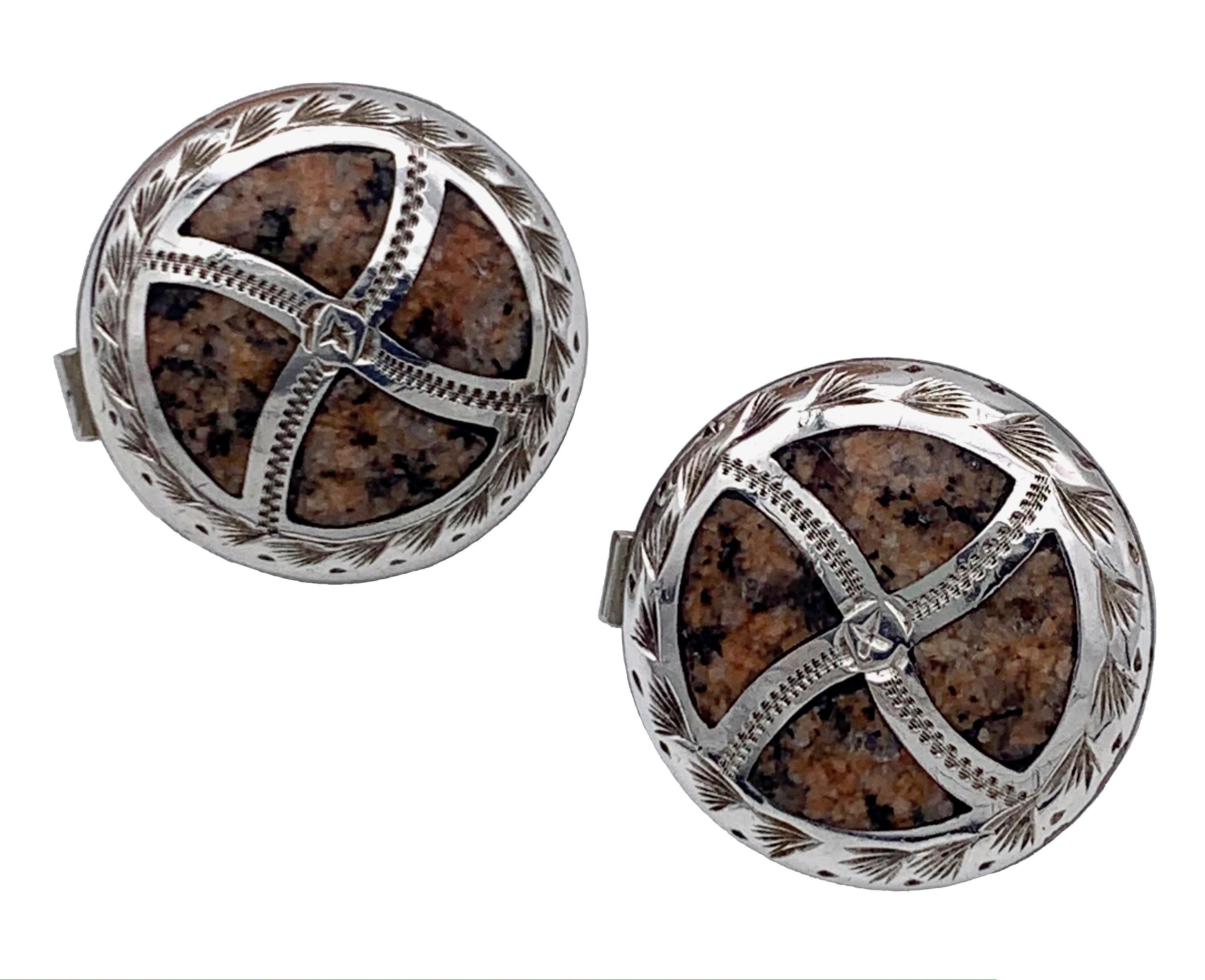 These finely engraved scottish batchelor buttons  were made out of polished granite and finly engraved sterling silver n 1880 ca. They have been fitted with a Reading partent mechanism.