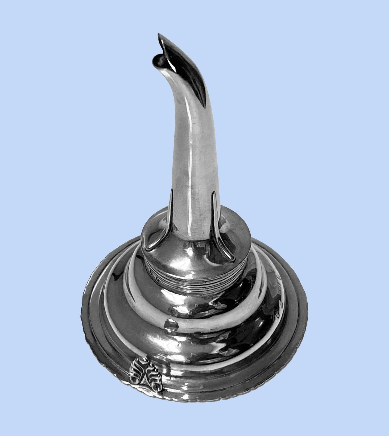 Antique Scottish silver wine funnel Edinburgh 1830 Leonard Urquhart. The Funnel of typical form, the base with anthemion surround and anthemion clip hook, plain body and upper strapped funnel. Marked on body and funnel. Height: 5 1/8 inches. Weight: