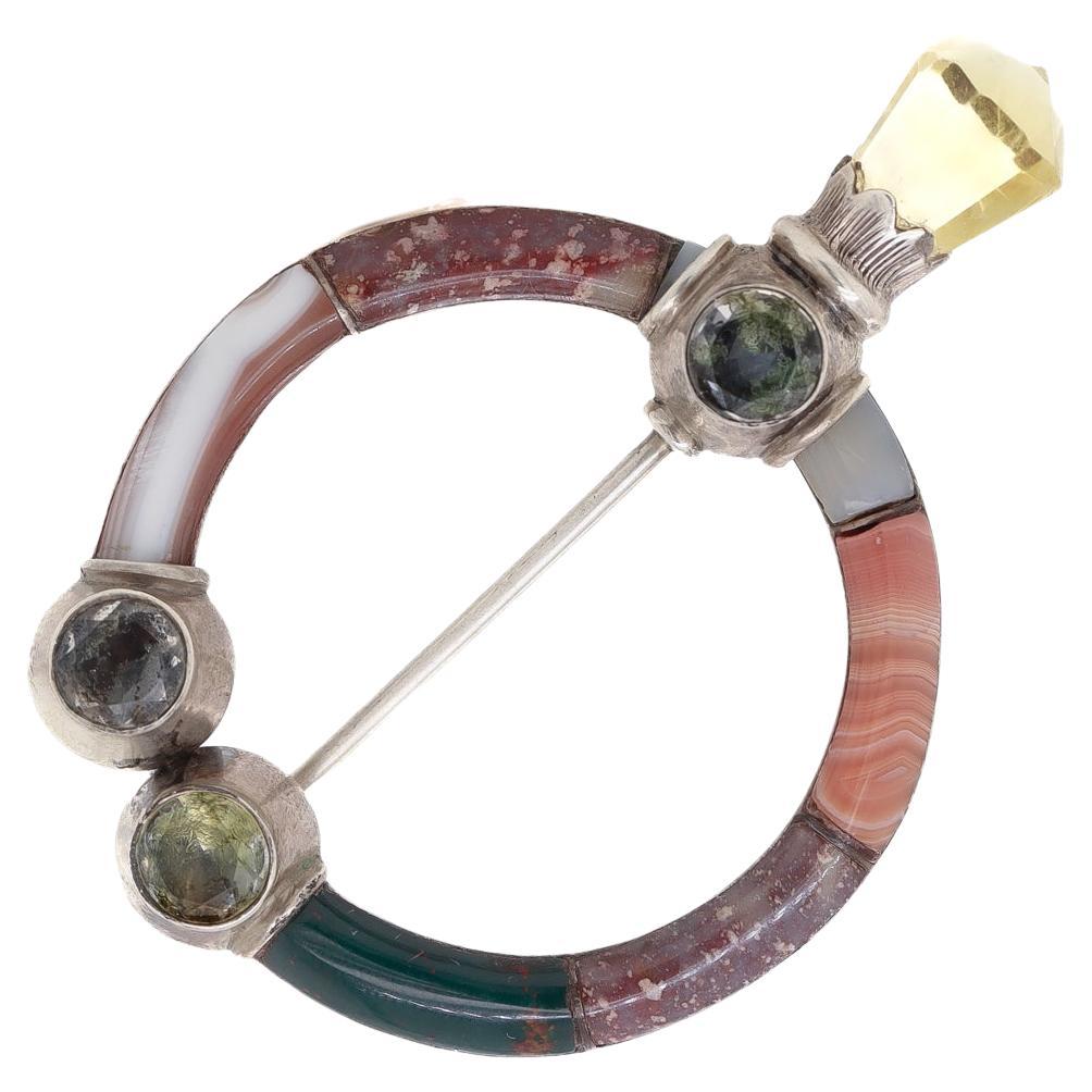 Antique Scottish Sterling Silver, Citrine, and Mixed Hardstone Penannular Brooch For Sale