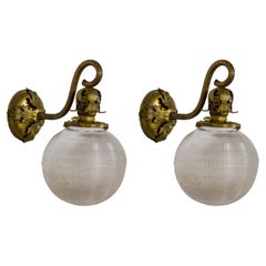 Antique Scroll Arm Textured Glass Globe Sconces (Pair)