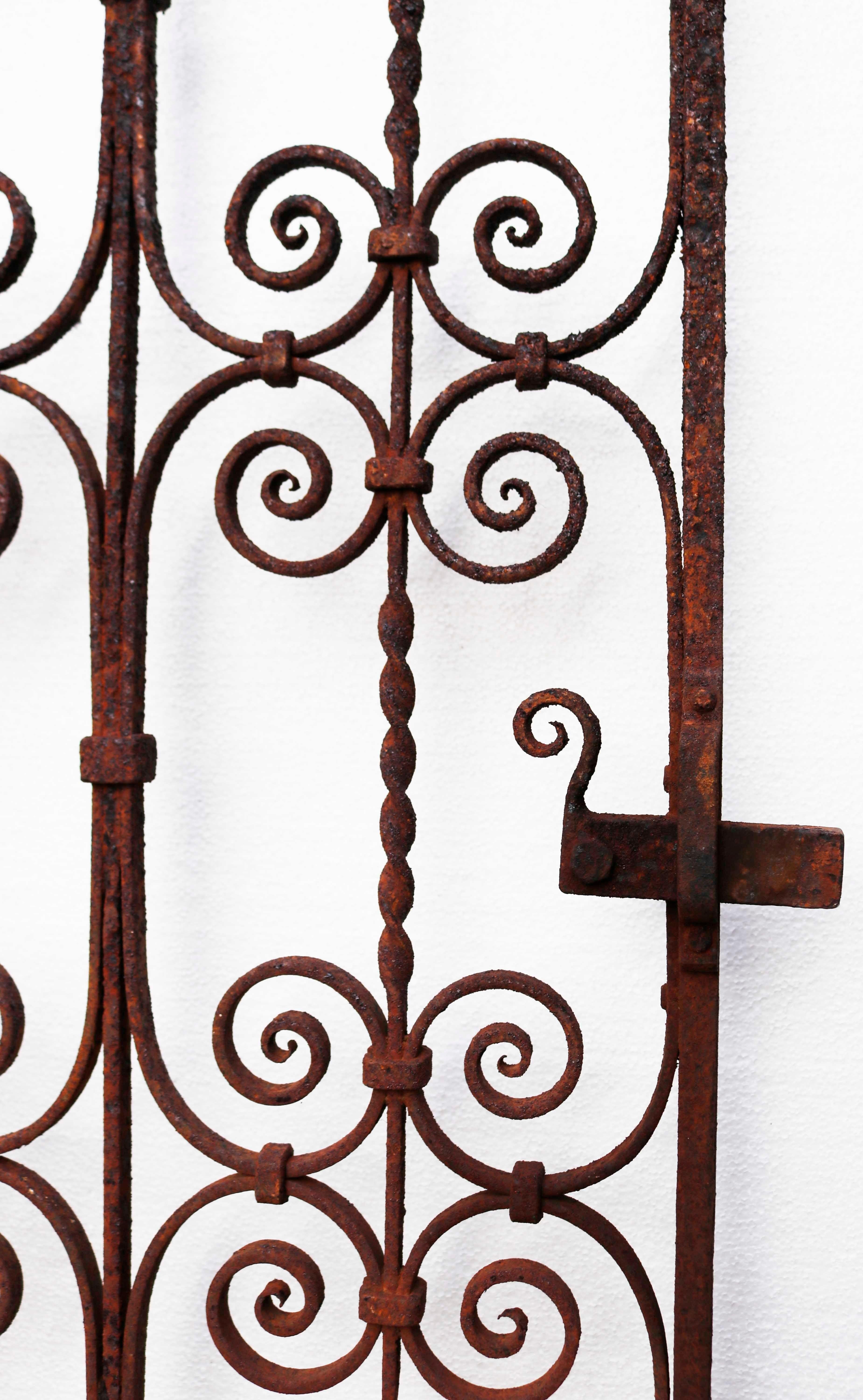 Antique scroll work wrought iron gate. An impressive garden gate with detailed scroll work throughout.



What is wrought iron?

Wrought iron is a type of refined, low carbon iron that is smelted and worked on with tools. The term wrought iron