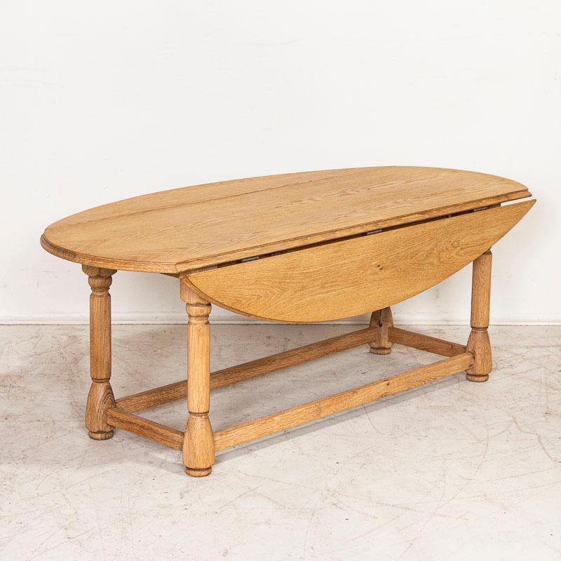 Antique Scrubbed Oak Drop Leaf Oval Coffee Table from France In Good Condition In Round Top, TX