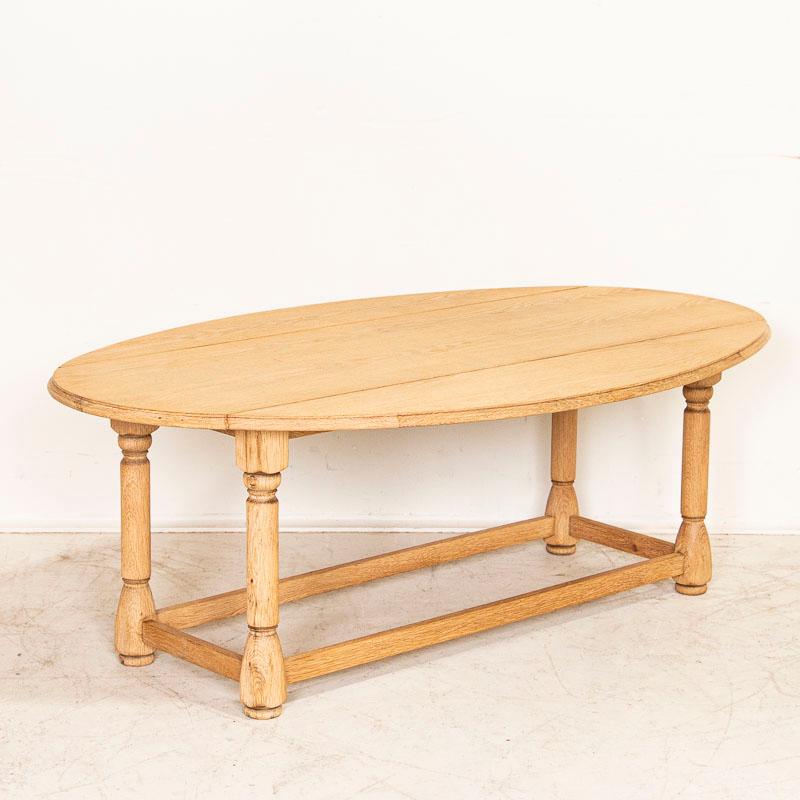 20th Century Antique Scrubbed Oak Drop Leaf Oval Coffee Table from France