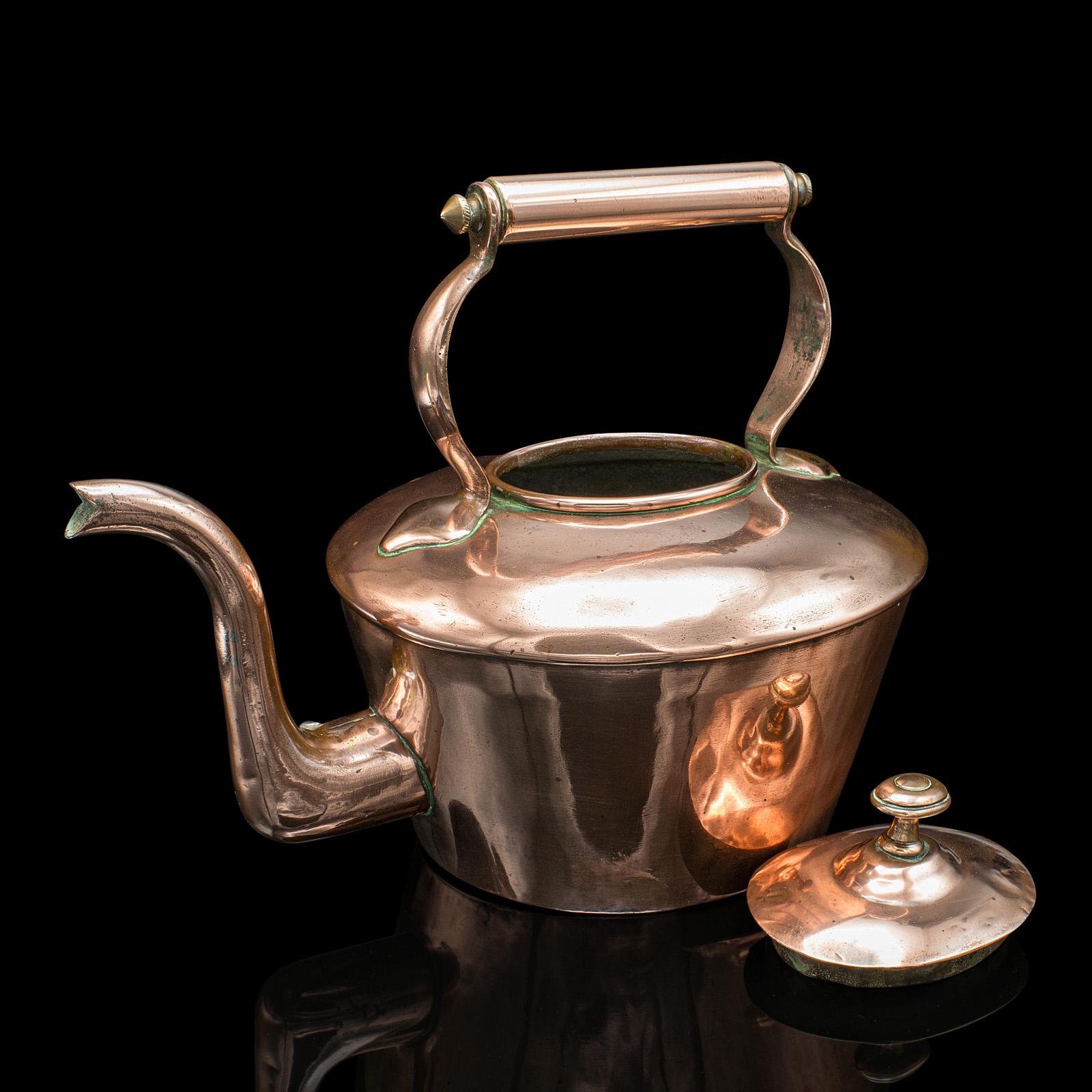 
This is an antique scullery kettle. An English, copper stovetop teapot, dating to the Victorian period, circa 1870.

Charming example with an attractive colour and polished finish
Displays a desirable aged patina and in good original order
Quality