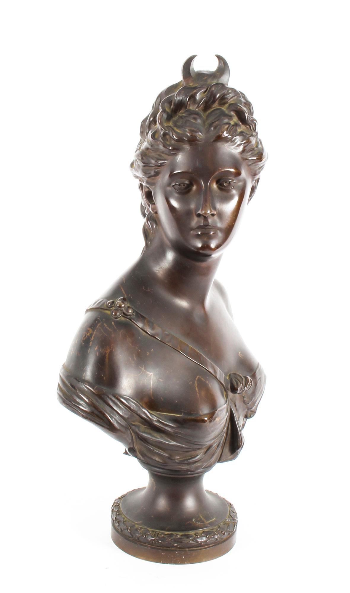 A beautifully sculpted patinated bronze bust of the Roman goddess Diana, after Jean Antoine Houdon (1740-1828), and dating from circa 1880.

The finely sculpted depiction of Diana wearing a classical flowing gown with an interesting crown on her