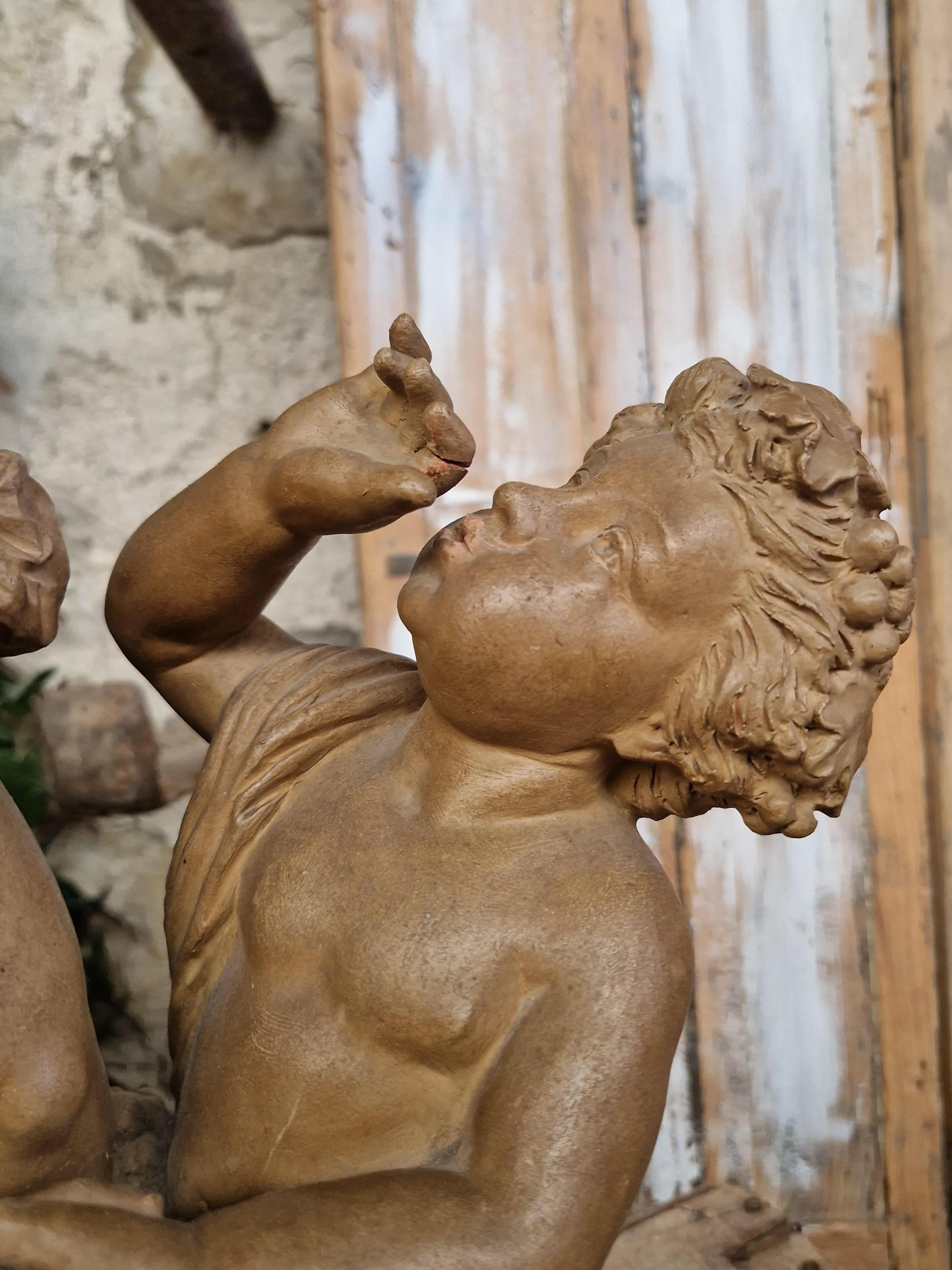 Hand-Carved Antique Sculpture Dancing Cupids in Terracotta Signed L Livi  For Sale