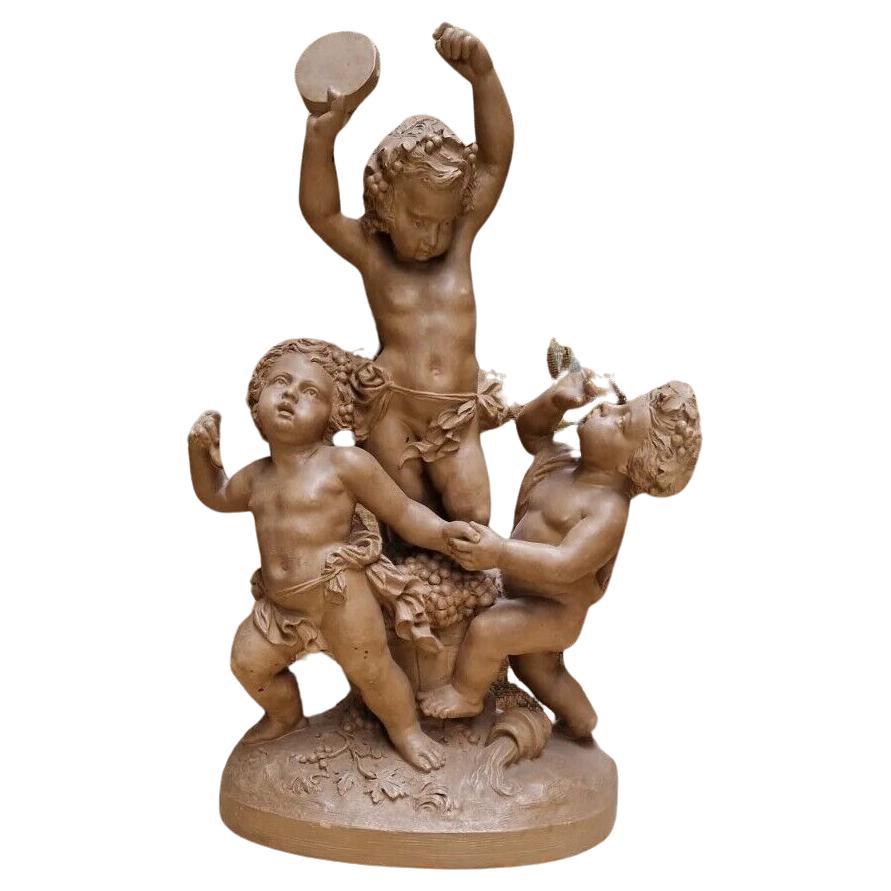 Escultura Antigua Bailando Cupidos en Terracota Firmada L Livi