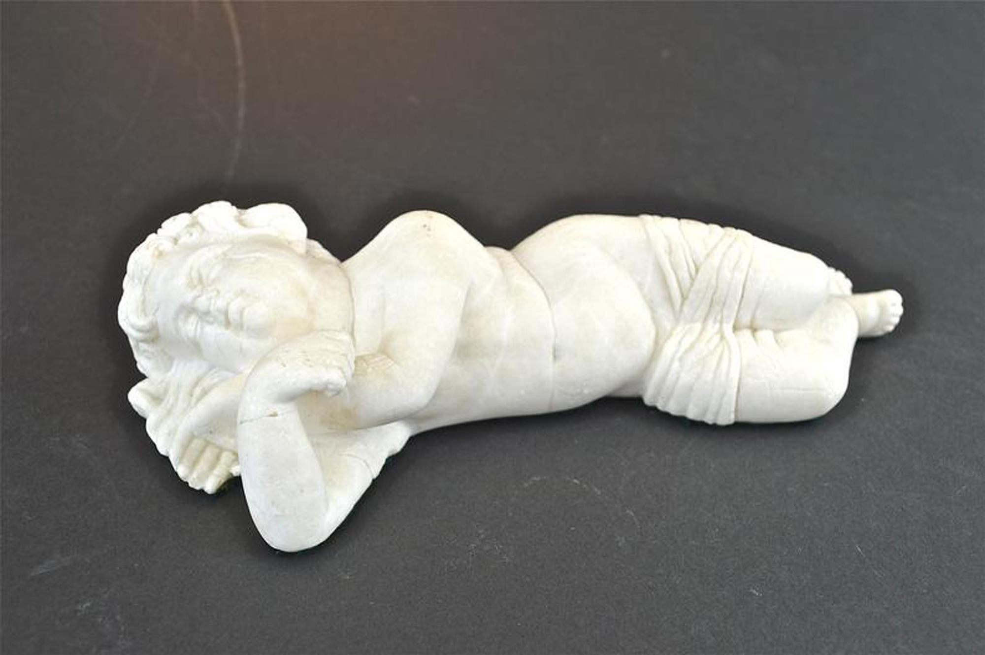 Classical Roman Antique Sculpture of a Sleeping Cherub For Sale
