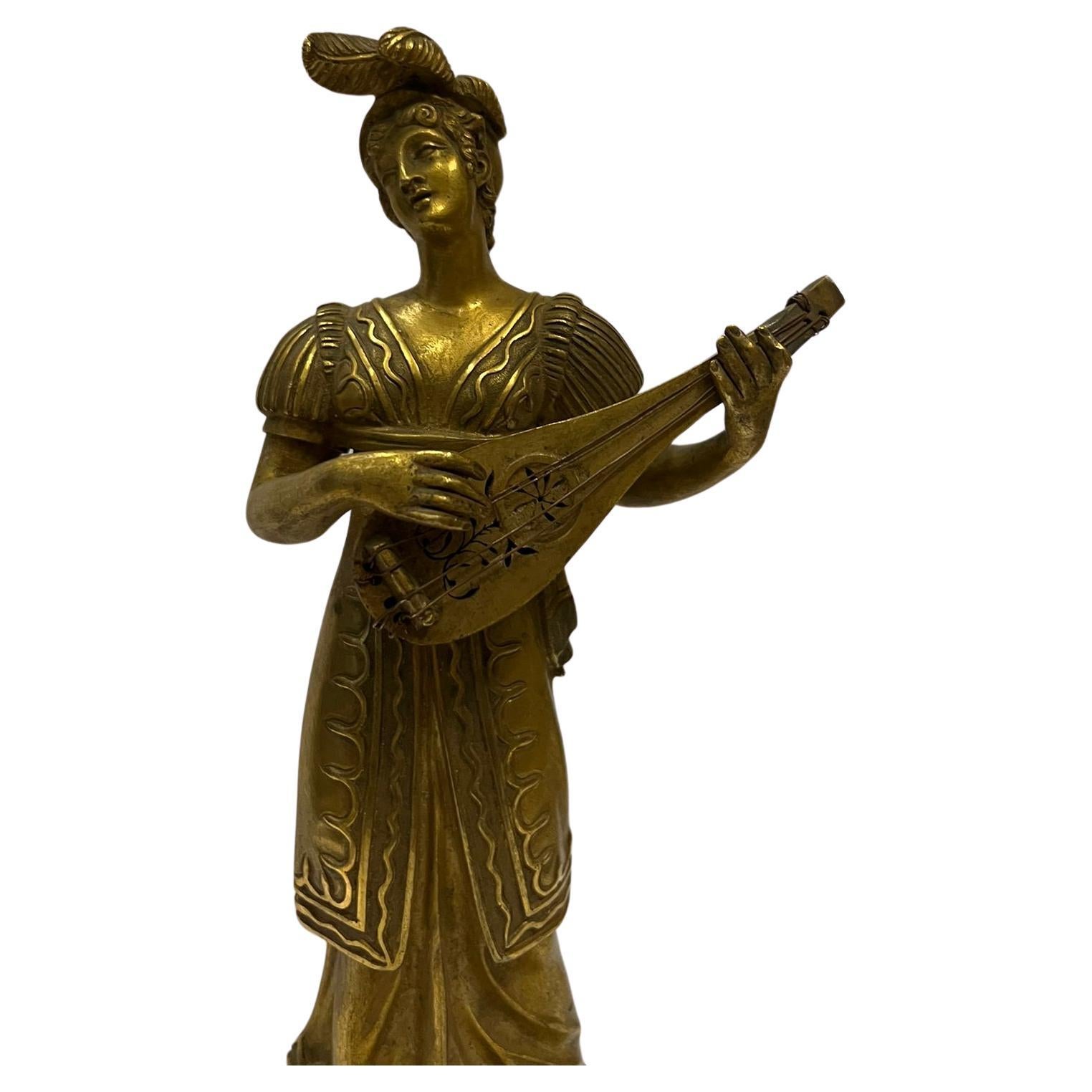 Late 19th Century Antique sculpture of an elegant lady with a mandolin   made of brass For Sale