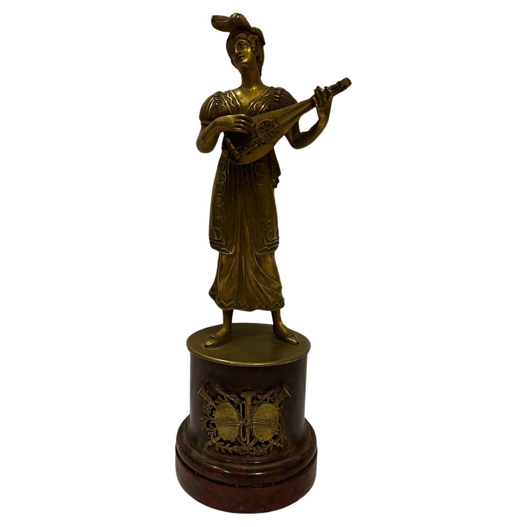 Brass Antique sculpture of an elegant lady with a mandolin   made of brass For Sale