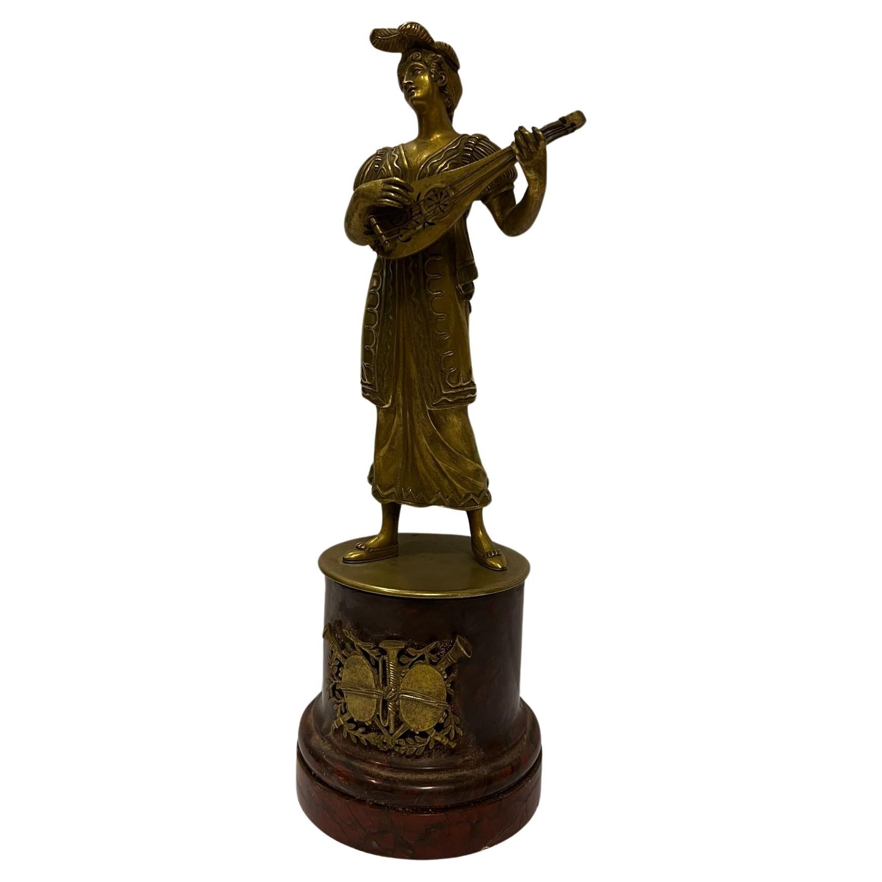 Antique sculpture of an elegant lady with a mandolin   made of brass For Sale