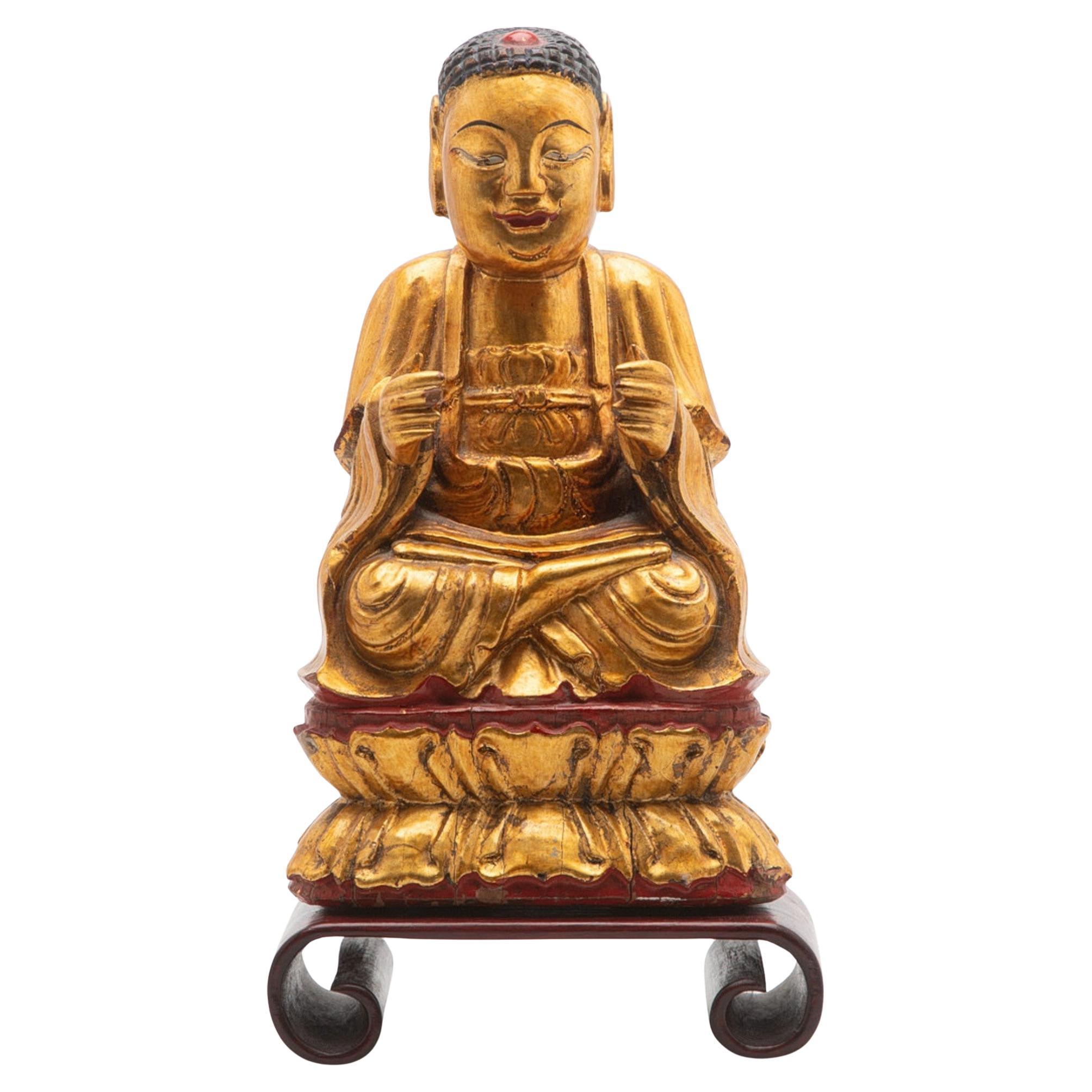 Antico Buddha seduto Amitābha Vietnam c.1900, scultura in legno dorato su loto
