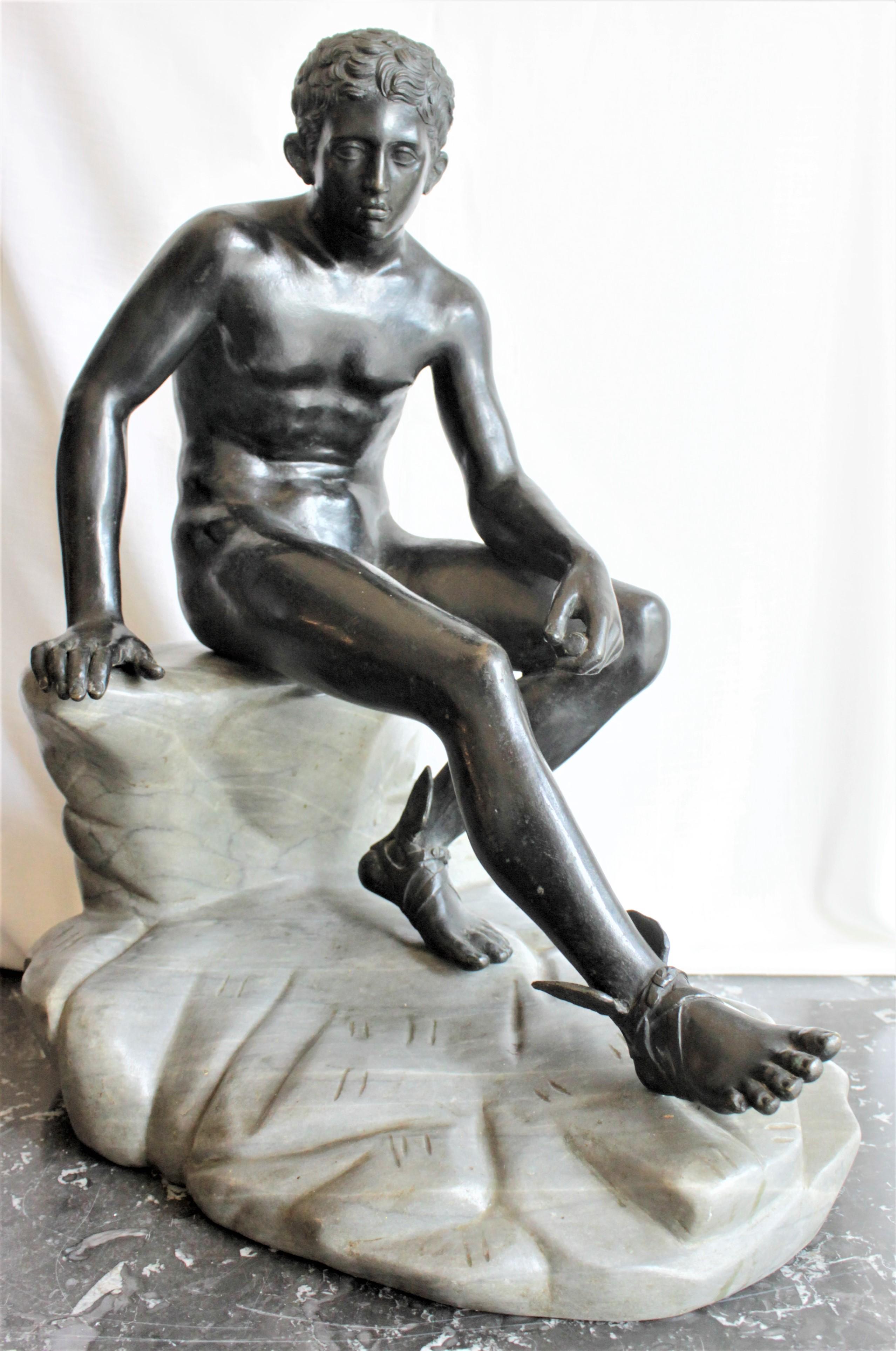 This large and substantial cast bronze sculpture is unsigned, but presumed to have been made in circa 1880 for the Grand Tour. The sculpture depicts the Greek god Hermes or mercury seated on a rock with one leg extended. The casting is very detailed