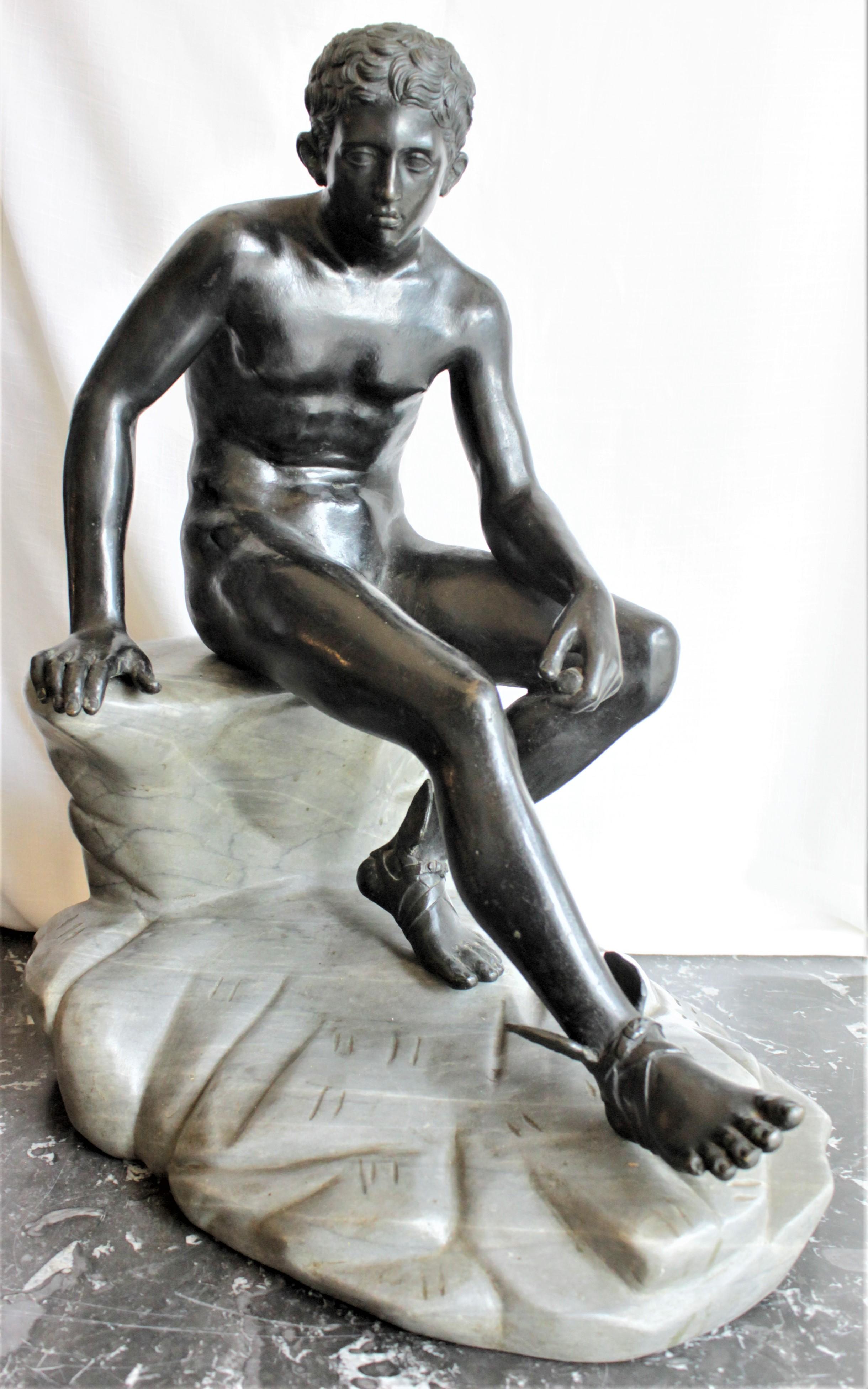 greek statue sitting