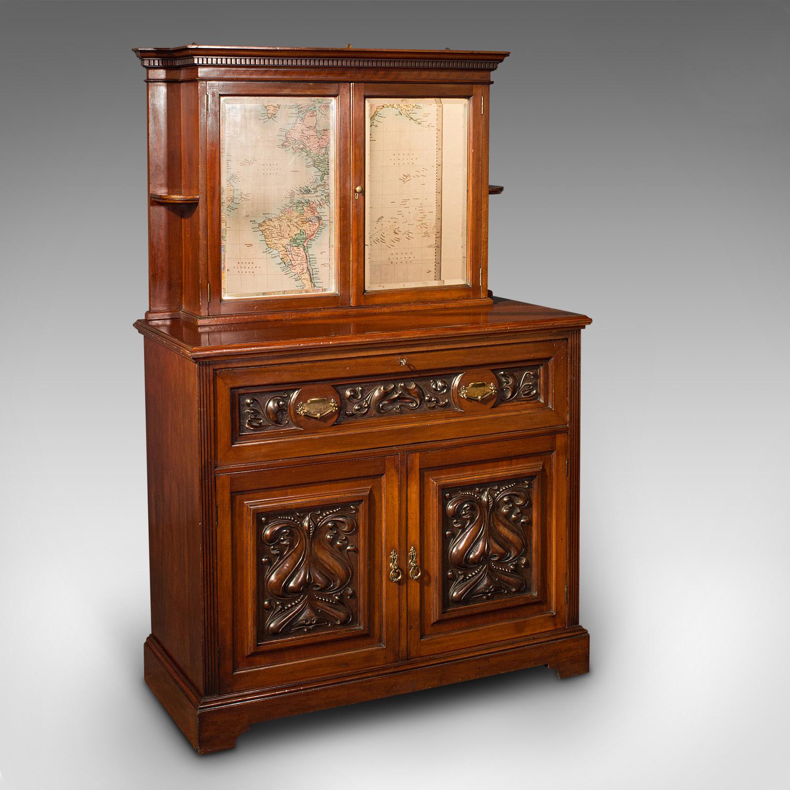 This is an antique secretaire sideboard. An English, mahogany drop-front correspondence cabinet, dating to the late Victorian period, circa 1900.

Of excellent proportion and graced with Art Nouveau taste
Displays a desirable aged patina and in