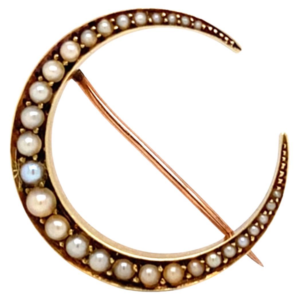 Broche antiguo de perlas de siembra y media luna de oro amarillo y rosa de 14 quilates en venta