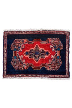 Antique Senneh Mat with Dark Blue Field and Red Medallion