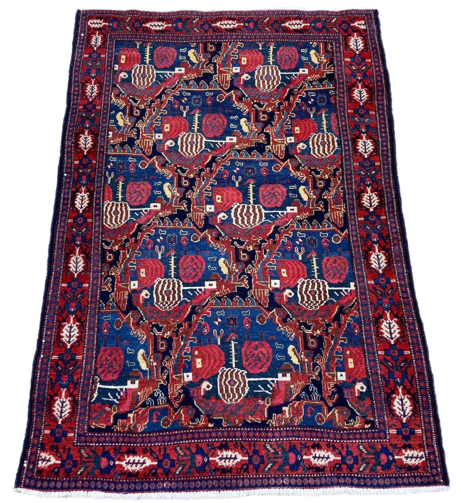 A beautiful antique Senneh rug, hand woven circa 1900 featuring a Gol Farang (literally ‘foreign flower’) design on a deep indigo field. Finely woven with great quality wool and wonderful colours of blues, yellows and reds.
Size: 1.55m x 1.07m (5ft